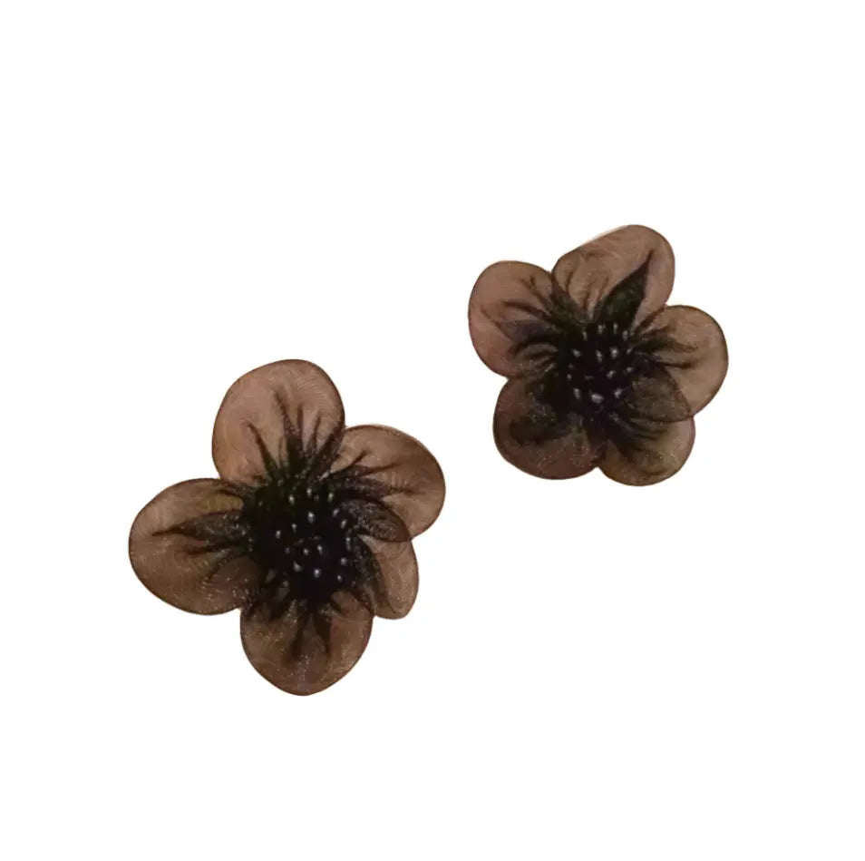 Close-up of Bloom Earring gold petal stud.